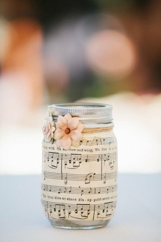 Sheet music on mason jars. Light a candle inside at night, and the music glows!: 